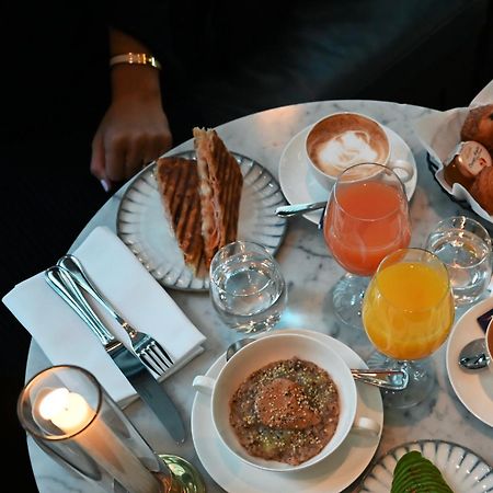 Villa Dagmar Stockholm Bagian luar foto A typical breakfast at the restaurant