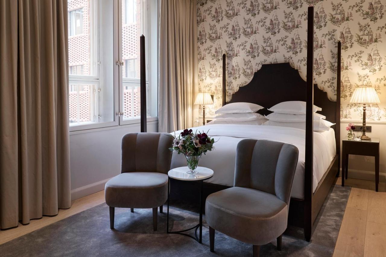 Villa Dagmar Stockholm Bagian luar foto A bedroom at the hotel