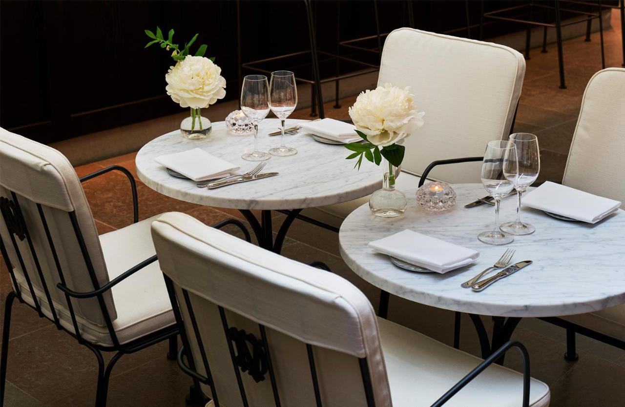 Villa Dagmar Stockholm Bagian luar foto Tables at the restaurant